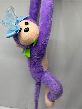 Plush Purple Puerto Rico Monkey with Blue Bow